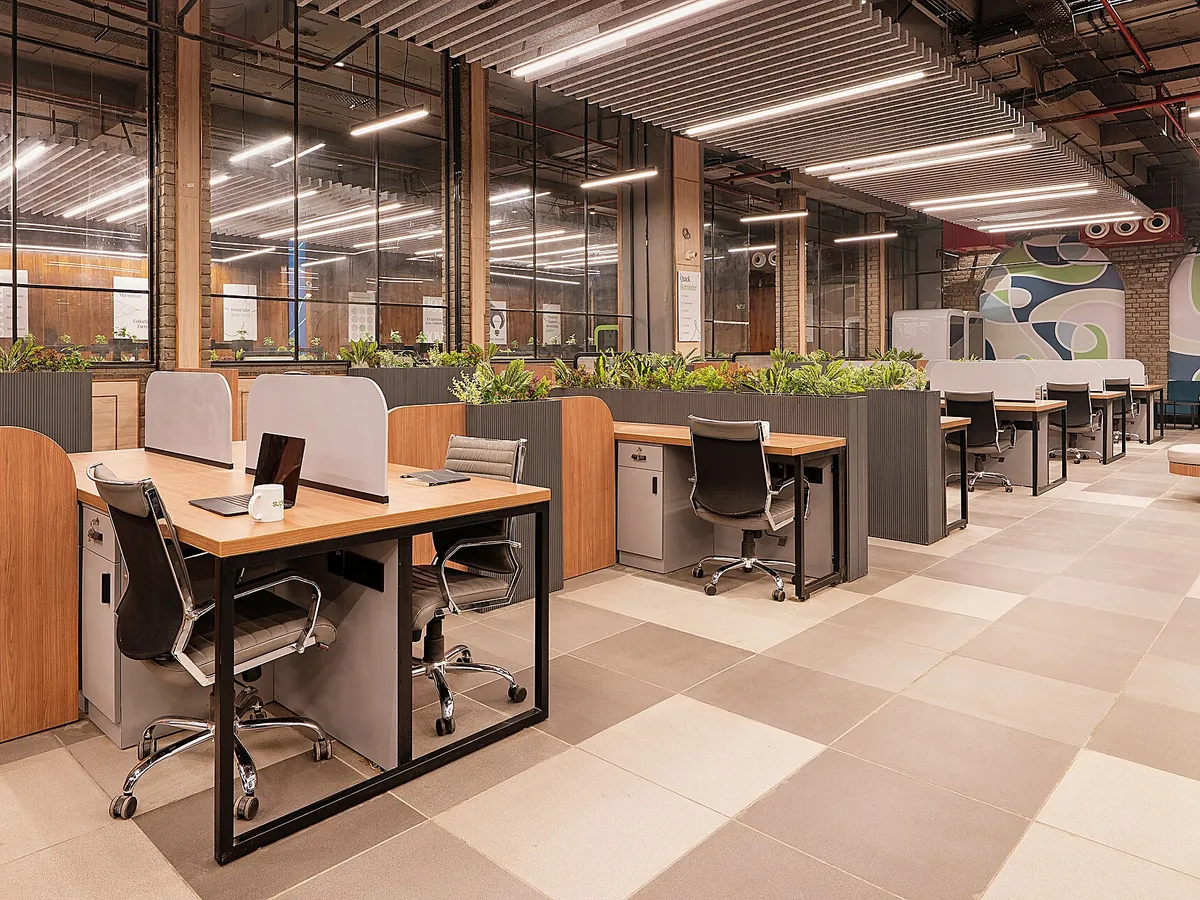 Open-plan office workspace with desks and workstations